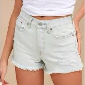 UO Levi’s High Rise Wedgie Fit Frayed Shorts